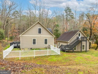 Step into serenity and style in this stunning craftsman-style on White Path Golf Club in Georgia - for sale on GolfHomes.com, golf home, golf lot