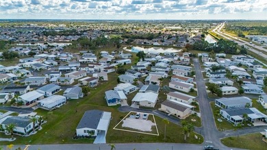 Large vacant lot located in a desirable 55+ manufactured home on Kings Gate Golf Club in Florida - for sale on GolfHomes.com, golf home, golf lot