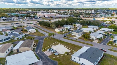 Large vacant lot located in a desirable 55+ manufactured home on Kings Gate Golf Club in Florida - for sale on GolfHomes.com, golf home, golf lot