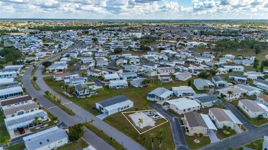 Large vacant lot located in a desirable 55+ manufactured home on Kings Gate Golf Club in Florida - for sale on GolfHomes.com, golf home, golf lot