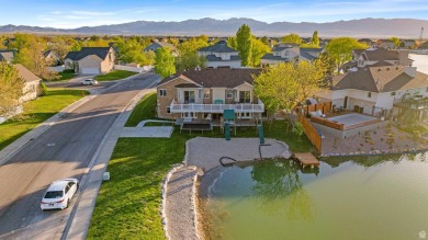 Lakefront Rambler with Private Dock, ADU Potential & Handicap on Stansbury Park Golf Club in Utah - for sale on GolfHomes.com, golf home, golf lot
