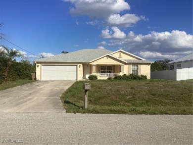 Backyard views like this are rare in Lehigh Acres. Located in a on Mirror Lakes Golf Club in Florida - for sale on GolfHomes.com, golf home, golf lot
