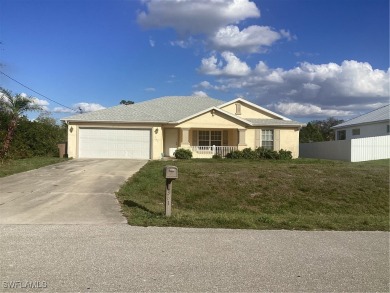 Backyard views like this are rare in Lehigh Acres. Located in a on Mirror Lakes Golf Club in Florida - for sale on GolfHomes.com, golf home, golf lot