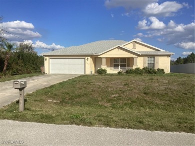 Backyard views like this are rare in Lehigh Acres. Located in a on Mirror Lakes Golf Club in Florida - for sale on GolfHomes.com, golf home, golf lot