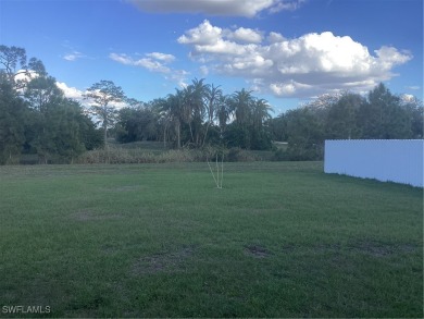 Backyard views like this are rare in Lehigh Acres. Located in a on Mirror Lakes Golf Club in Florida - for sale on GolfHomes.com, golf home, golf lot
