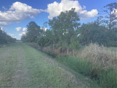 Backyard views like this are rare in Lehigh Acres. Located in a on Mirror Lakes Golf Club in Florida - for sale on GolfHomes.com, golf home, golf lot