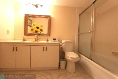Spacious 2-bedroom, 2-bathroom condo on the 3rd floor features on Wynmoor Golf Course in Florida - for sale on GolfHomes.com, golf home, golf lot