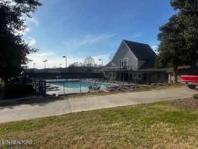 With spectacular mountain, lake and golf course views, this lot on Rarity Bay Country Club - Loudon in Tennessee - for sale on GolfHomes.com, golf home, golf lot