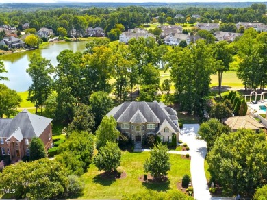 Exclusive Fairview Manor Estate with Lake & Golf Views! Timeless on TPC at Wakefield Plantation in North Carolina - for sale on GolfHomes.com, golf home, golf lot