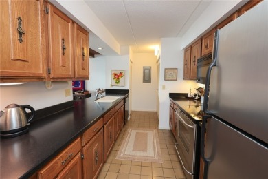 Enjoy the sunrises on the spacious balcony with million dollar on Bristol Harbour Golf Club in New York - for sale on GolfHomes.com, golf home, golf lot
