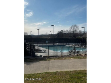 With spectacular mountain, lake and golf course views, this lot on Rarity Bay Country Club - Loudon in Tennessee - for sale on GolfHomes.com, golf home, golf lot