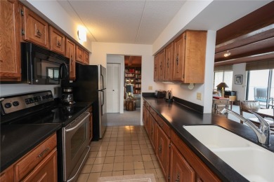 Enjoy the sunrises on the spacious balcony with million dollar on Bristol Harbour Golf Club in New York - for sale on GolfHomes.com, golf home, golf lot
