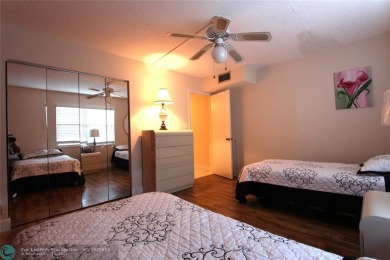 Spacious 2-bedroom, 2-bathroom condo on the 3rd floor features on Wynmoor Golf Course in Florida - for sale on GolfHomes.com, golf home, golf lot