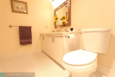 Spacious 2-bedroom, 2-bathroom condo on the 3rd floor features on Wynmoor Golf Course in Florida - for sale on GolfHomes.com, golf home, golf lot