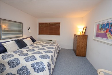 Enjoy the sunrises on the spacious balcony with million dollar on Bristol Harbour Golf Club in New York - for sale on GolfHomes.com, golf home, golf lot