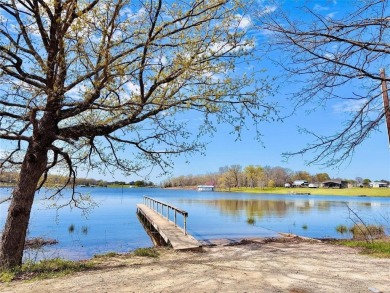 Embrace the charm of lakeside living with this impressive on Links At Lands End in Texas - for sale on GolfHomes.com, golf home, golf lot