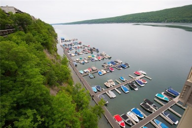 Enjoy the sunrises on the spacious balcony with million dollar on Bristol Harbour Golf Club in New York - for sale on GolfHomes.com, golf home, golf lot