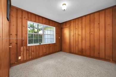 Located on a picturesque, tree lined street in the heart of on Granada Golf Club in Florida - for sale on GolfHomes.com, golf home, golf lot