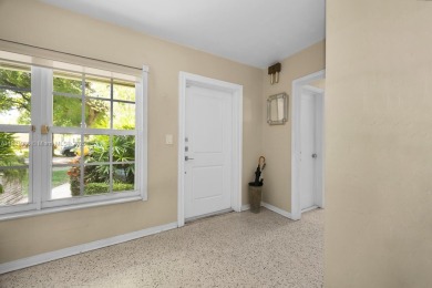 Located on a picturesque, tree lined street in the heart of on Granada Golf Club in Florida - for sale on GolfHomes.com, golf home, golf lot