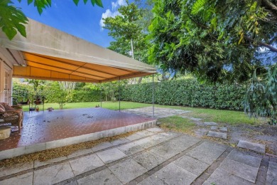 Located on a picturesque, tree lined street in the heart of on Granada Golf Club in Florida - for sale on GolfHomes.com, golf home, golf lot