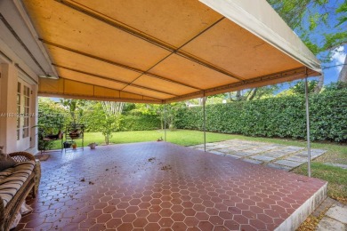 Located on a picturesque, tree lined street in the heart of on Granada Golf Club in Florida - for sale on GolfHomes.com, golf home, golf lot