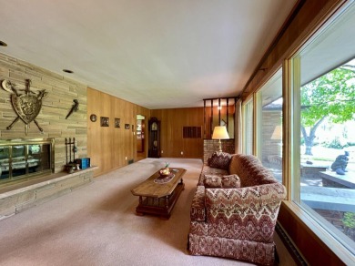 Impeccably maintained mid-century gem, on the market for the on New Berlin Hills Golf Course in Wisconsin - for sale on GolfHomes.com, golf home, golf lot