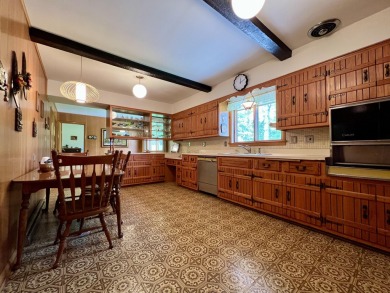 Impeccably maintained mid-century gem, on the market for the on New Berlin Hills Golf Course in Wisconsin - for sale on GolfHomes.com, golf home, golf lot