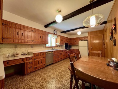 Impeccably maintained mid-century gem, on the market for the on New Berlin Hills Golf Course in Wisconsin - for sale on GolfHomes.com, golf home, golf lot