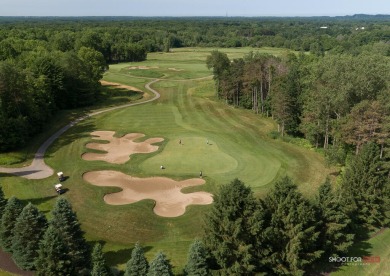 Nestled in the serene community of The Ravines, LOT 70 presents on Ravines Golf Club in Michigan - for sale on GolfHomes.com, golf home, golf lot