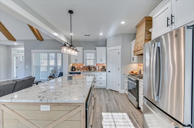 This beautifully crafted home blends modern farmhouse style with on Mount Vintage Plantation and Golf Club  in South Carolina - for sale on GolfHomes.com, golf home, golf lot