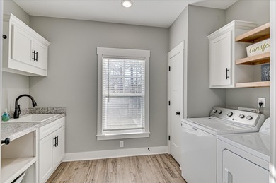 This beautifully crafted home blends modern farmhouse style with on Mount Vintage Plantation and Golf Club  in South Carolina - for sale on GolfHomes.com, golf home, golf lot