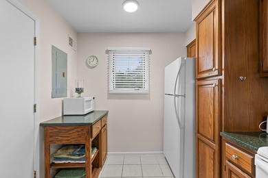 Two-Bedroom, Two-and-a-Half Bath End-Unit, Townhouse with Creek on The Seabrook Island Club in South Carolina - for sale on GolfHomes.com, golf home, golf lot