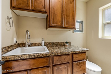 Stunning 4-bedroom, 2.5-bath home on the 4th fairway in the on Flagstaff Ranch Golf Club in Arizona - for sale on GolfHomes.com, golf home, golf lot