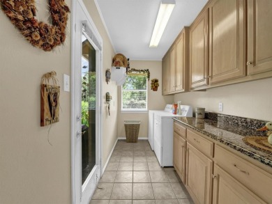 Welcome to 9705 Argyle Court -- a meticulously cared-for home on Pecan Plantation Country Club in Texas - for sale on GolfHomes.com, golf home, golf lot