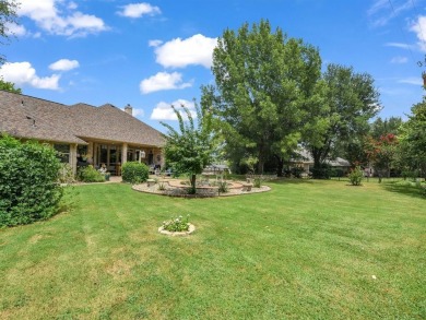 Welcome to 9705 Argyle Court -- a meticulously cared-for home on Pecan Plantation Country Club in Texas - for sale on GolfHomes.com, golf home, golf lot