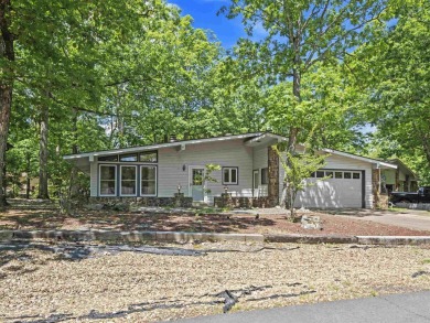 Discover the perfect blend of comfort and leisure in this on DeSoto Golf Course in Arkansas - for sale on GolfHomes.com, golf home, golf lot