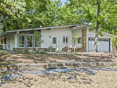 Discover the perfect blend of comfort and leisure in this on DeSoto Golf Course in Arkansas - for sale on GolfHomes.com, golf home, golf lot