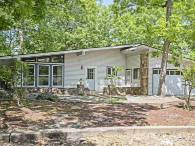 Discover the perfect blend of comfort and leisure in this on DeSoto Golf Course in Arkansas - for sale on GolfHomes.com, golf home, golf lot