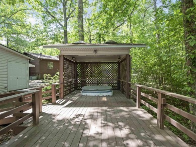 Discover the perfect blend of comfort and leisure in this on DeSoto Golf Course in Arkansas - for sale on GolfHomes.com, golf home, golf lot
