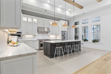 Welcome to this stunning 5-bedroom, 4.5-bath home in the heart on Willbrook Plantation in South Carolina - for sale on GolfHomes.com, golf home, golf lot