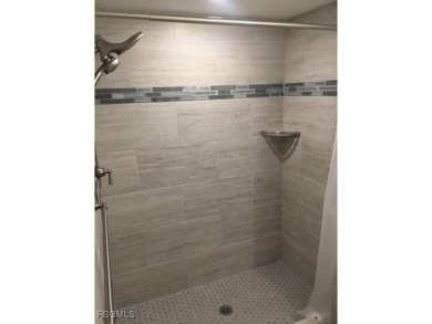 First-floor end unit in desirable Cross Creek Country Club - no on Cross Creek Country Club in Florida - for sale on GolfHomes.com, golf home, golf lot