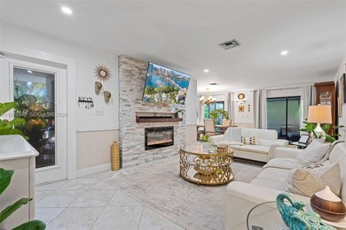 Welcome to your private oasis in the highly sought-after Country on Country Club of Miami in Florida - for sale on GolfHomes.com, golf home, golf lot