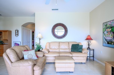 Light and bright 4th floor condo has large windows and lanai on Cedar Hammock Golf and Country Club in Florida - for sale on GolfHomes.com, golf home, golf lot