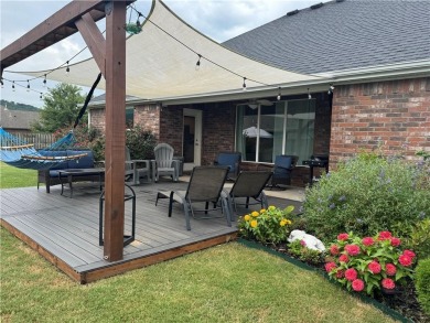 Located in a quiet, family-friendly neighborhood, this home is on Stonebridge Meadows Golf Club in Arkansas - for sale on GolfHomes.com, golf home, golf lot
