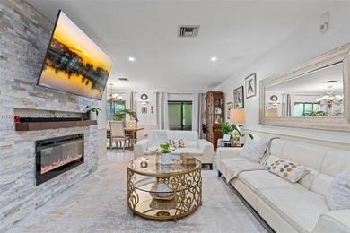 Welcome to your private oasis in the highly sought-after Country on Country Club of Miami in Florida - for sale on GolfHomes.com, golf home, golf lot