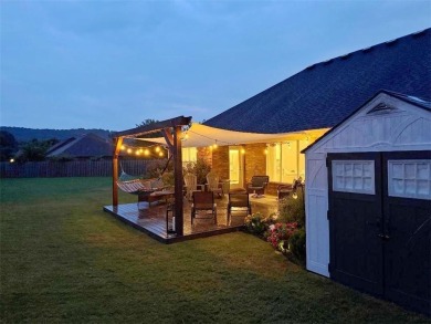 Located in a quiet, family-friendly neighborhood, this home is on Stonebridge Meadows Golf Club in Arkansas - for sale on GolfHomes.com, golf home, golf lot
