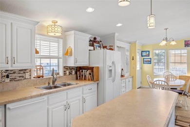 AMAZING VALUE! Fantastic price on this sun-filled, impeccably on Saint Andrews South Golf Club in Florida - for sale on GolfHomes.com, golf home, golf lot