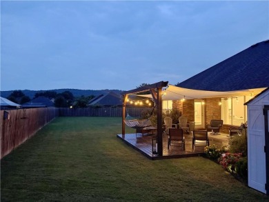 Located in a quiet, family-friendly neighborhood, this home is on Stonebridge Meadows Golf Club in Arkansas - for sale on GolfHomes.com, golf home, golf lot