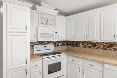 AMAZING VALUE! Fantastic price on this sun-filled, impeccably on Saint Andrews South Golf Club in Florida - for sale on GolfHomes.com, golf home, golf lot