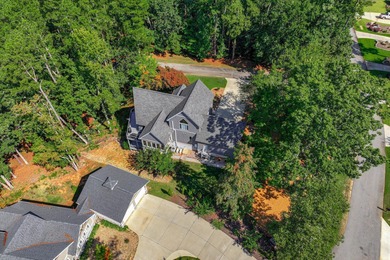 Experience lakefront living at its finest in this beautifully on Monticello Golf Club At Savannah Lakes in South Carolina - for sale on GolfHomes.com, golf home, golf lot